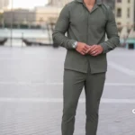 Two-piece premium black athletic tracksuit for men, moisture-wicking fabric for gym and sports.