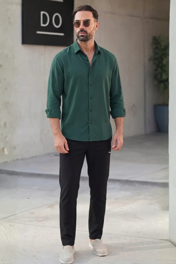Two-piece premium black athletic tracksuit for men, moisture-wicking fabric for gym and sports.