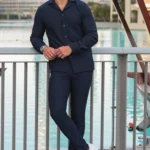 Two-piece premium black athletic tracksuit for men, moisture-wicking fabric for gym and sports.